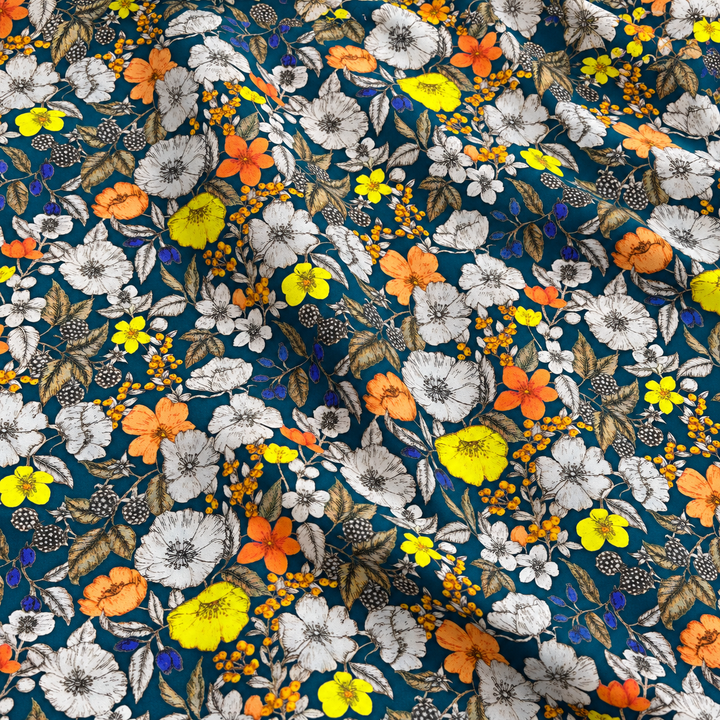 Teal Wildflower Print, Teal · Orange · Yellow, styled with natural fabric creases
