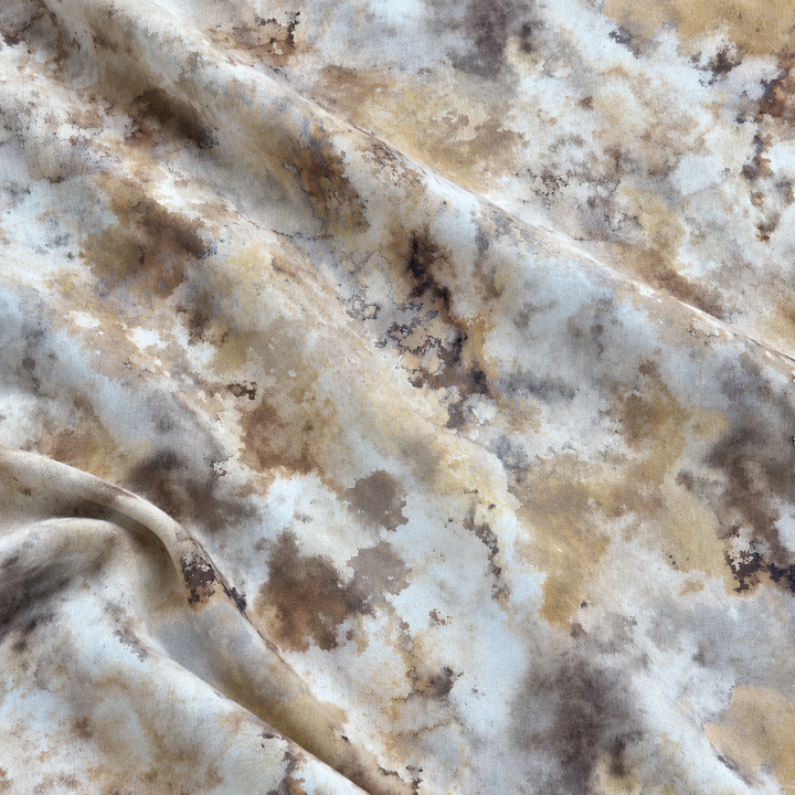 Cloudscape Linen Print, Sand, styled with natural fabric creases