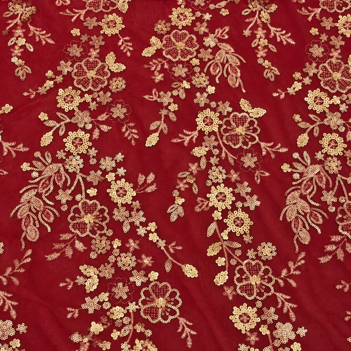 Red velvet tulle with gold floral embroidery and sequins in a square detail photograph