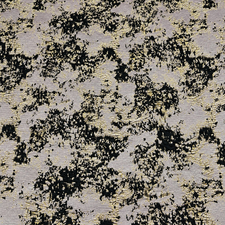 Square detail of black gold abstract jacquard showing its woven abstract motif