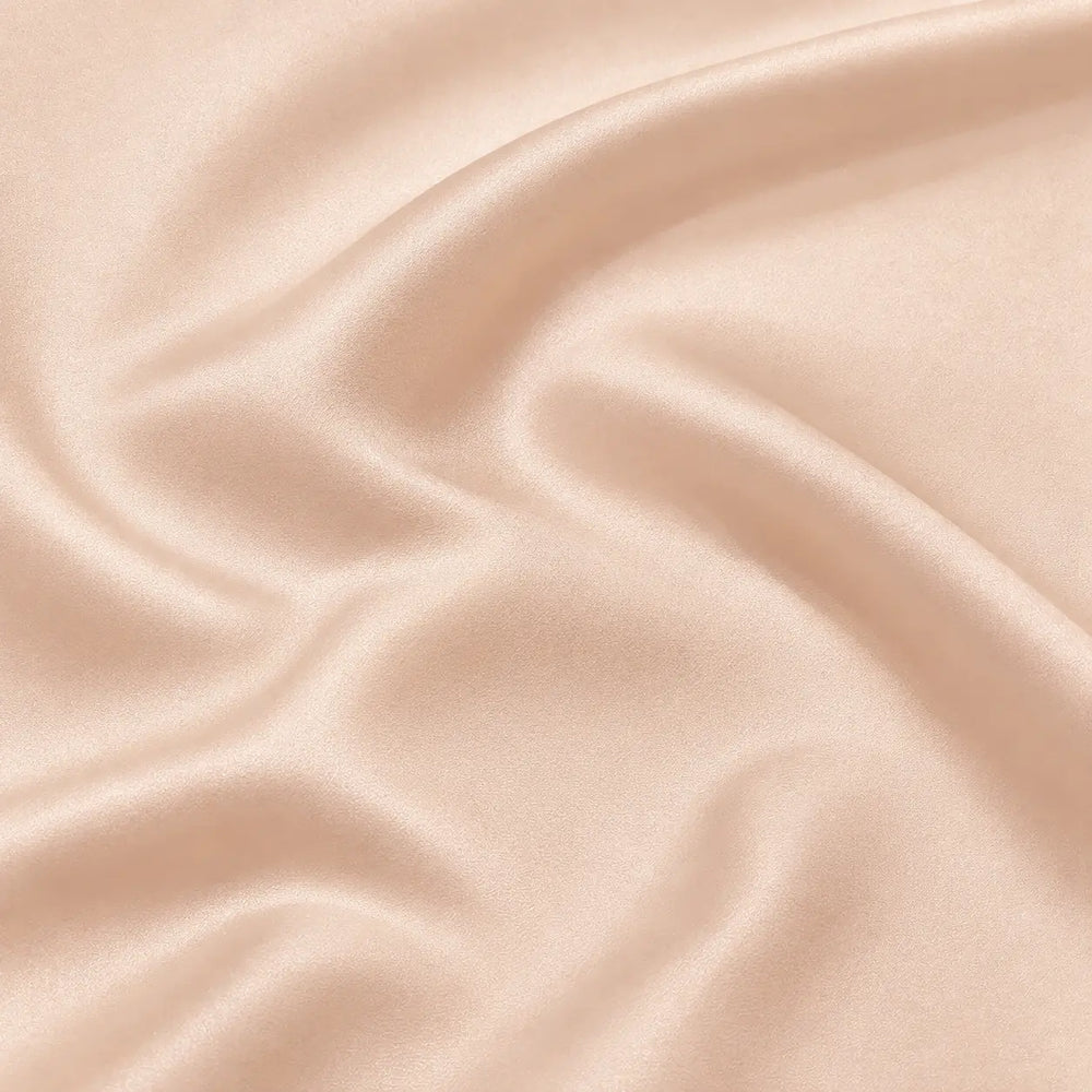 Rose gold satin in soft folds