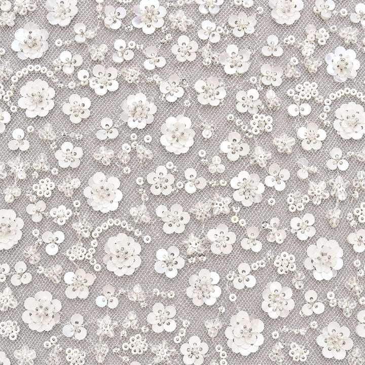 White sequin blossoms and beaded vines on sheer white tulle